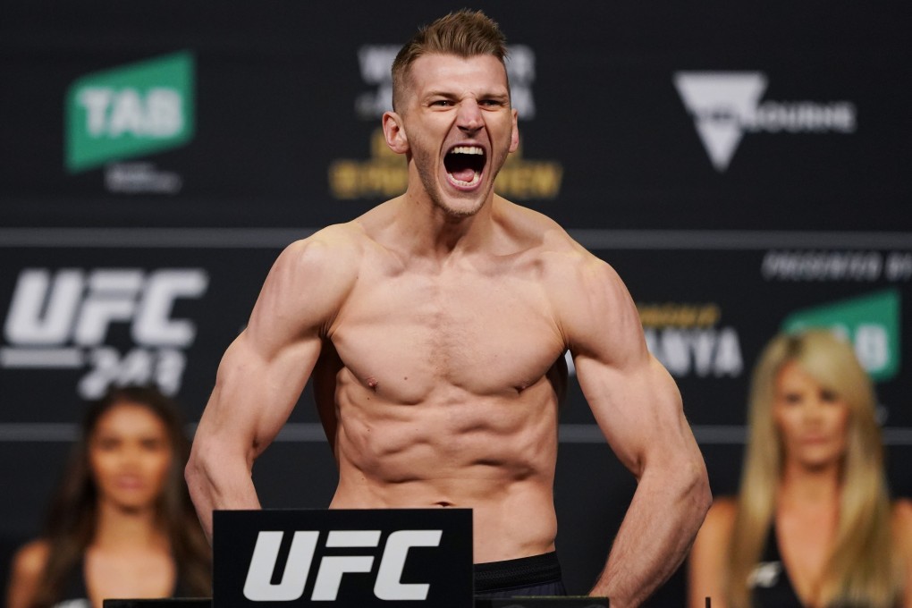 Dan Hooker reacts after stepping on the scale during the UFC 243 ceremonial weigh-in at Marvel Stadium in Melbourne, Australia. Photo: EPA