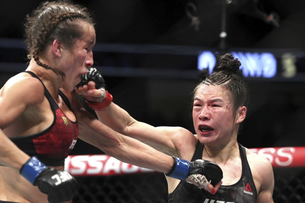 UFC women’s strawweight champion Zhang Weili punches former champion Joanna Jedrzejczyk at UFC 248. Photo: AP