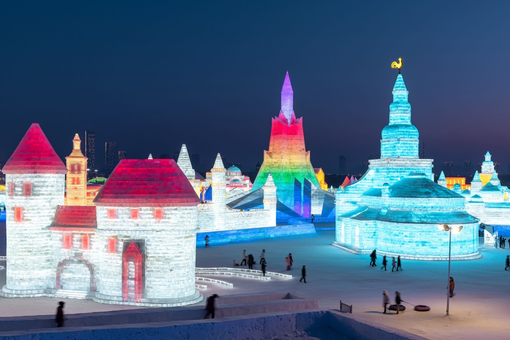 Visitors take in the ice sculptures at the Harbin Ice and Snow Festival in northeastern China's Heilongjiang province. Photo: AFP