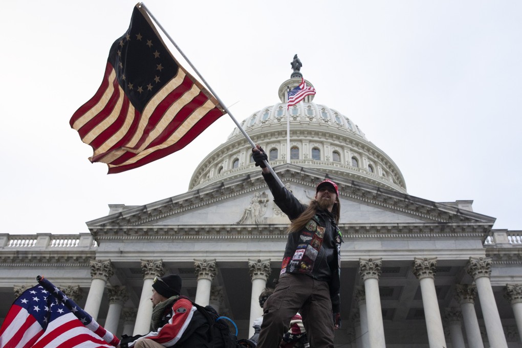 Pro-Trump protesters storm the grounds of the US Capitol on Wednesday as Congress prepares to certify the 2020 US presidential election results. Photo: EPA-EFE