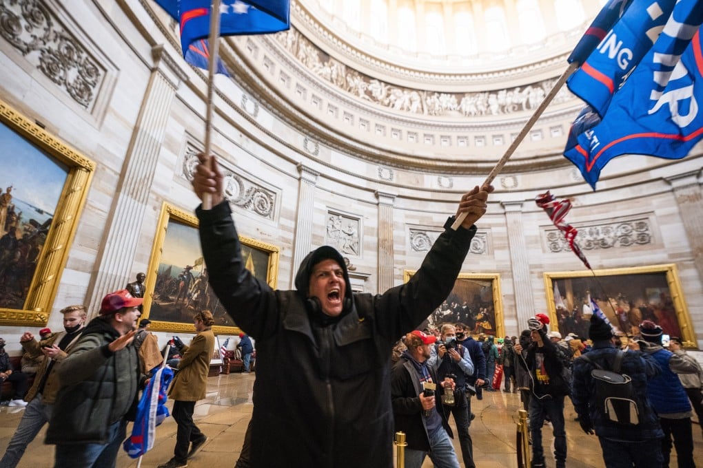 Rioters egged on by US President Donald Trump force their way into the Capitol Rotunda in Washington on Wednesday. Photo: EPA-EFE