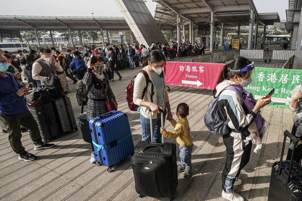 Travellers at the border crossing between Hong Kong and Shenzhen. Photo: Felix Wong