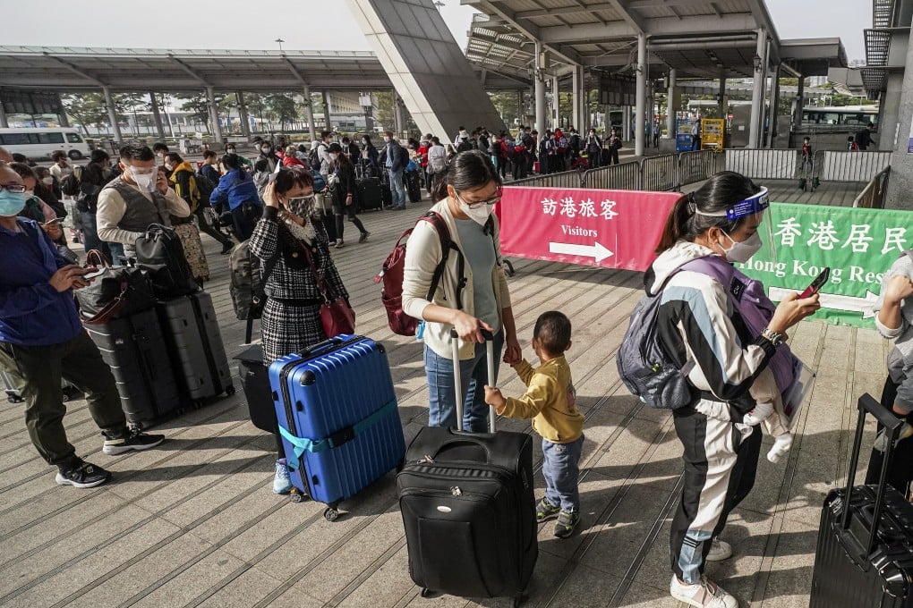 Travellers at the border crossing between Hong Kong and Shenzhen. Photo: Felix Wong