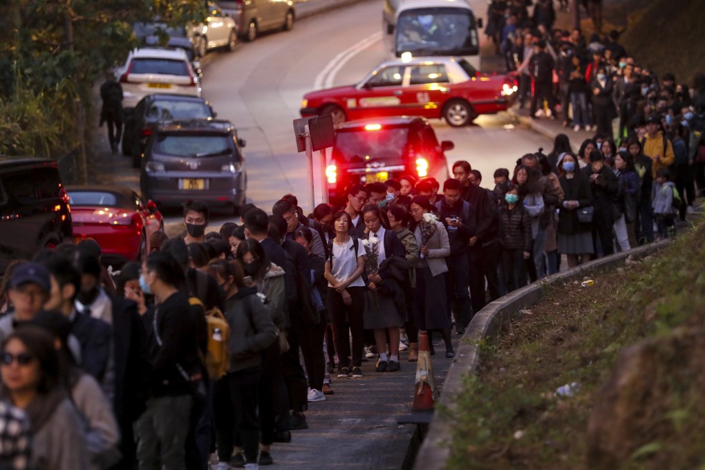 Mourners queue near a memorial for 22-year-old Alex Chow in November 2019. Photo: Sam Tsang