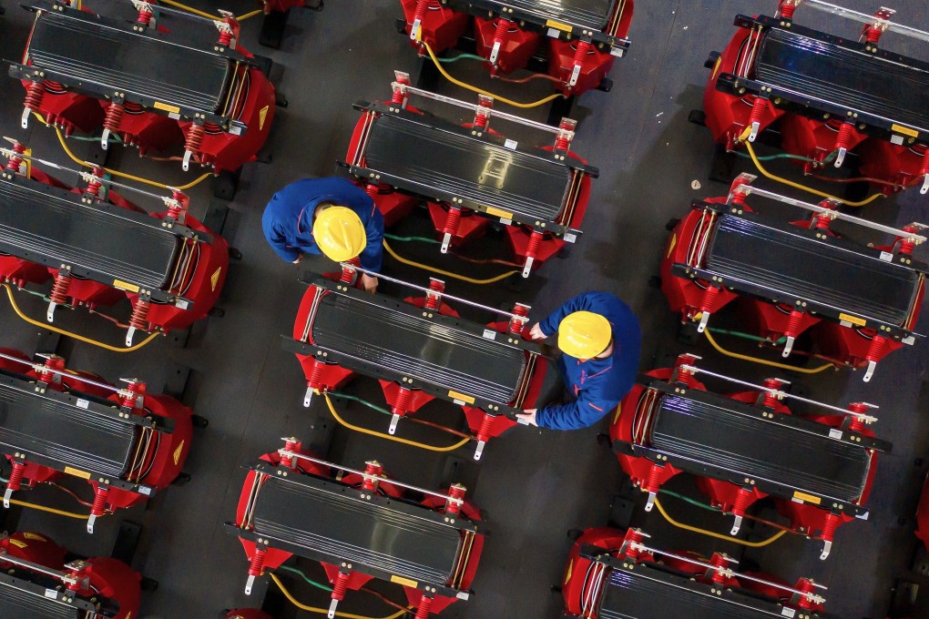 China will grow by 7.9 per cent this year, the IMF forecasts, down from its previous prediction of 8.2 per cent growth made in October. Photo: AFP