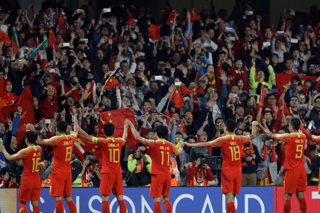 Chinese players greet supporters at the end of the AFC Asian Cup 2019 round of 16 win over Thailand. Photo: AP