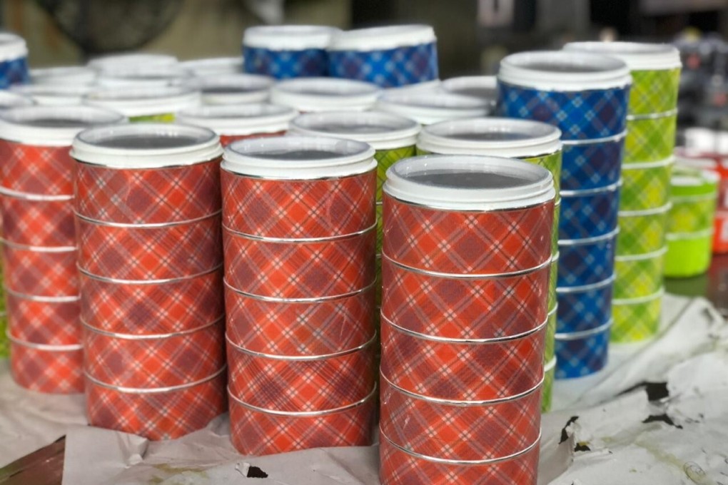 The wedding meal was delivered in insulated tiffin carriers to the homes of the guests who could not attend the ceremony. Photo: Weddings and Marigold