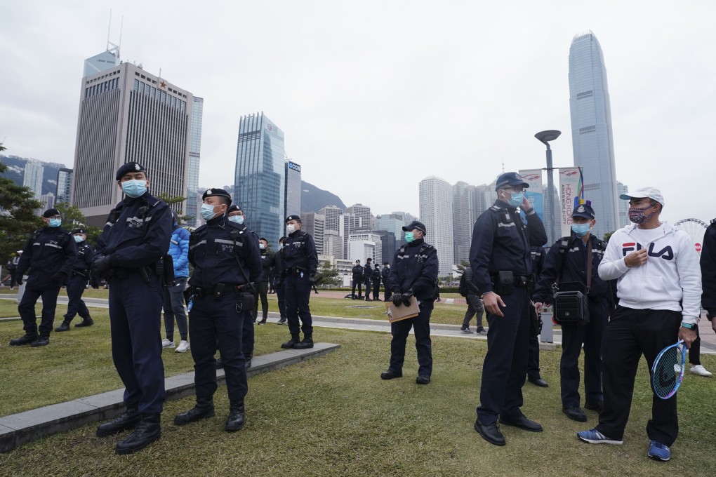Police break up a gathering of tennis players at Tamar Park on Monday. Photo: Felix Wong