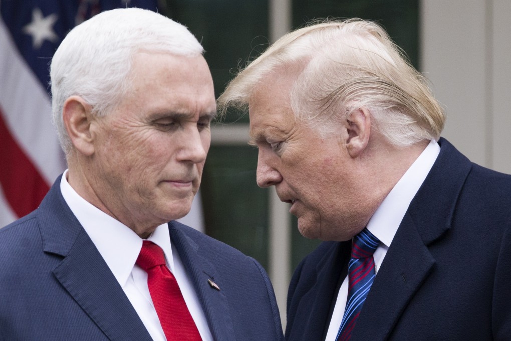 US Vice-President Mike Pence confers with US President Donald Trump during a press conference in the Rose Garden of the White House. The two met on Monday evening. Photo: EPA-EFE