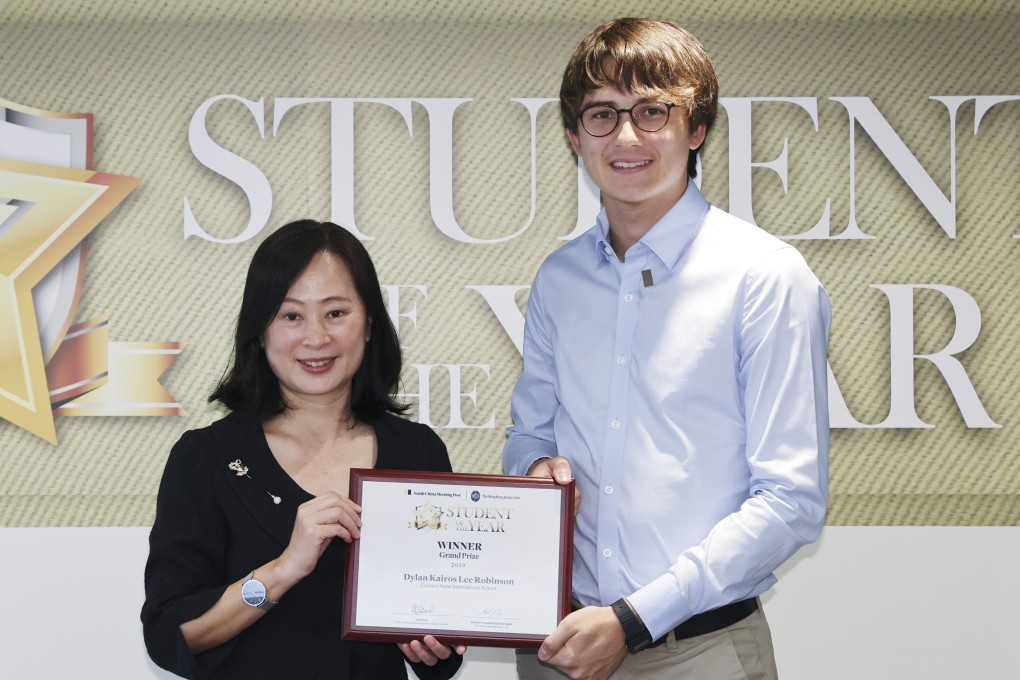 Tammy Tam, the Post’s editor-in-chief (left) and Student of Year Awards Grand Prize winner Dylan Robinson. Photo: Nora Tam