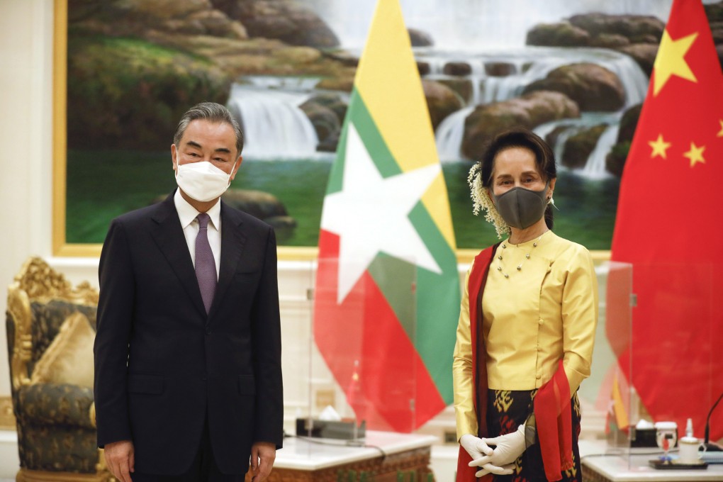 Myanmar's de facto leader Aung San Suu Kyi meets Chinese Foreign Minister Wang Yi in the capital Naypyitaw on Monday. Photo: AP