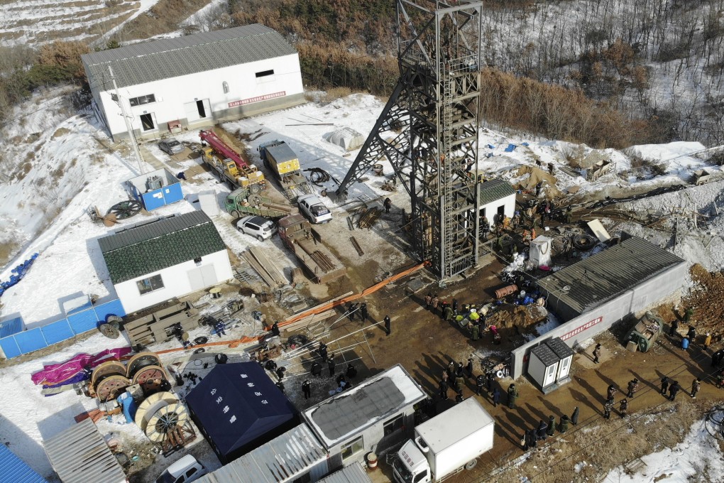Emergency personnel work on Tuesday to reach more than 20 people trapped underground by a blast at a gold mine in Qixia, Shandong province. Photo: Xinhua