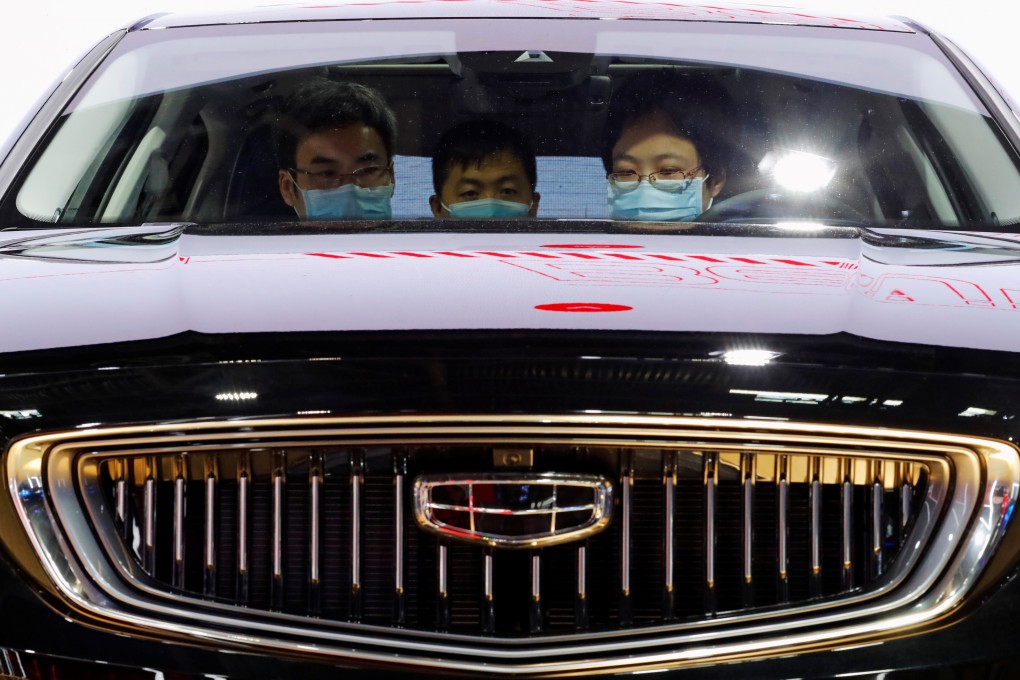 A Geely car is displayed at the Beijing International Automotive Exhibition on September 26 last year. The carmaker’s deals with Foxconn and Baidu suggest that it wants to stay ahead of the competition, an analyst says. Photo: Reuters