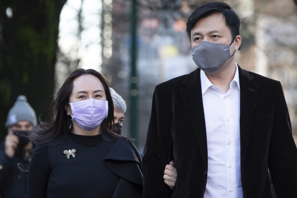 Meng Wanzhou and her husband, Liu Xiaozong, during a break from a court hearing in Vancouver, British Columbia, on December 9, 2020. Photo: AP