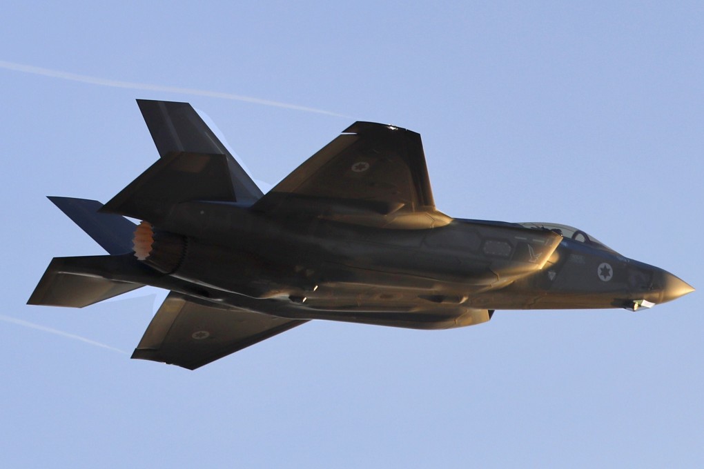 An Israeli air force fighter jet is seen flying at the Hatzerim Air Force base in Israel's Negev desert. Photo: AFP