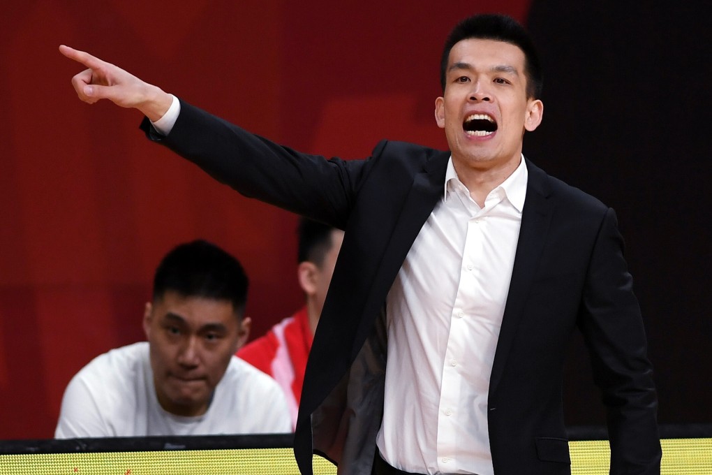Beijing Ducks head coach Xie Libin instructs his team in their Chinese Basketball Association game against the Qingdao Eagles. Photo: Xinhua