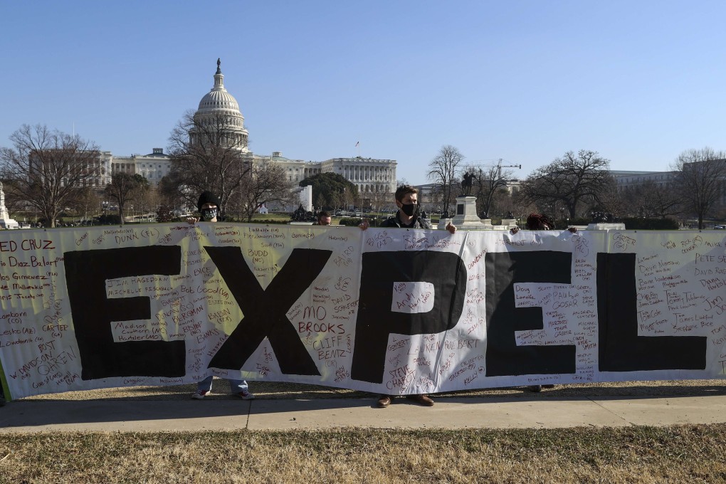 Anti-Trump protesters gather near the US Capitol on Wednesday as the House of Representatives voted to impeach President Donald Trump. Photo: Getty Images/AFP