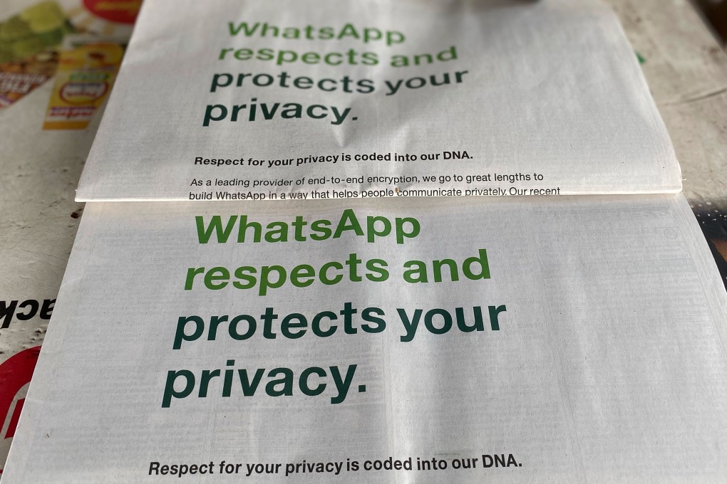 Newspapers with front page advertisements reassuring users of WhatsApp’s privacy protections are displayed in India on Wednesday. Photo: AFP