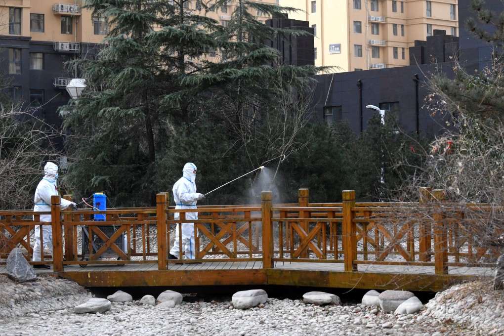 Disinfectant is sprayed in an area classed as medium-risk in Shijiazhuang, Hebei province. Photo: Xinhua