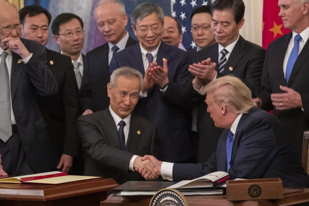 The world’s two largest economies signed the deal on January 15 last year, effectively calling a ceasefire in a trade war launched by the US in July 2018. Photo: EPA-EFE