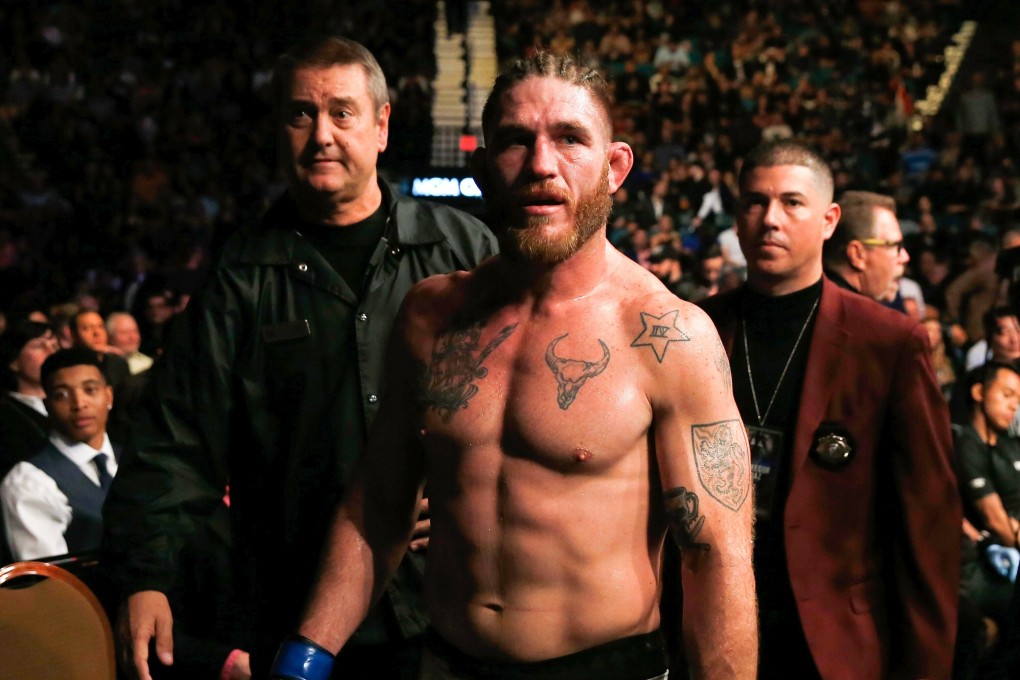Tom Lawlor exits the Octagon after his loss to Corey Anderson in their light heavyweight bout at UFC 196 inside MGM Grand Garden Arena on March 5, 2016 in Las Vegas, Nevada. Photo: Christian Petersen/Zuffa LLC via Getty Images