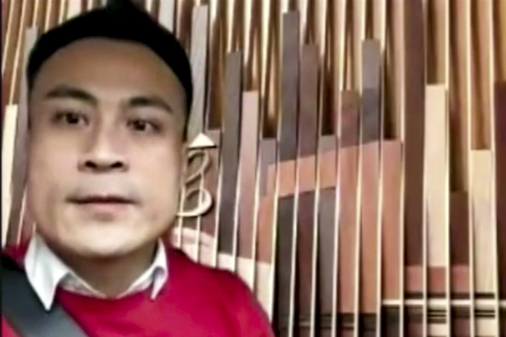 Lawmaker Kwok Wai-keung wears what appears to be a seat belt in front of a virtual background during a Legco Zoom conference on Thursday. Photo: Handout