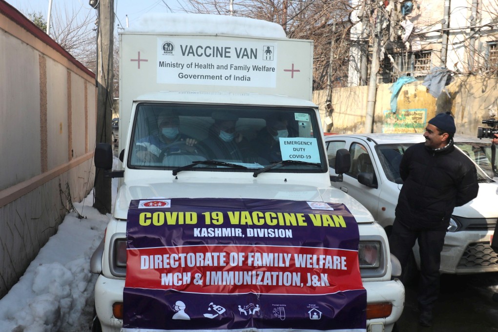 A vehicle delivers boxes of Covid-19 vaccines in Srinagar, Indian Kashmir. Photo: EPA-EFE