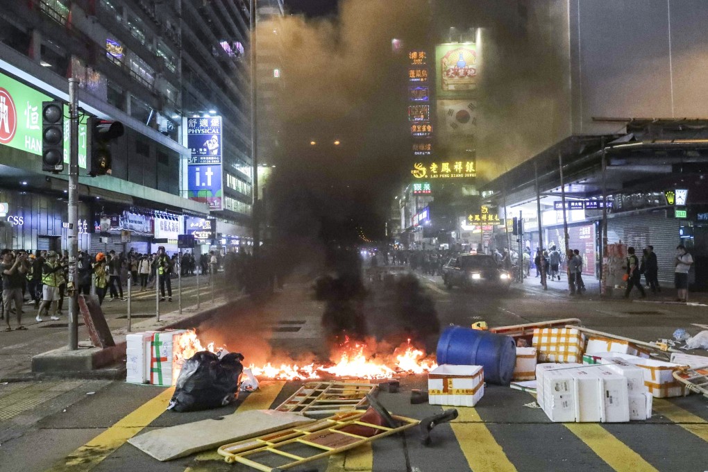 Among three sentenced on Friday for their roles in a 2019 protest was a Hong Kong firefighter, the first to be jailed over the months-long social unrest. Photo: Edmond So