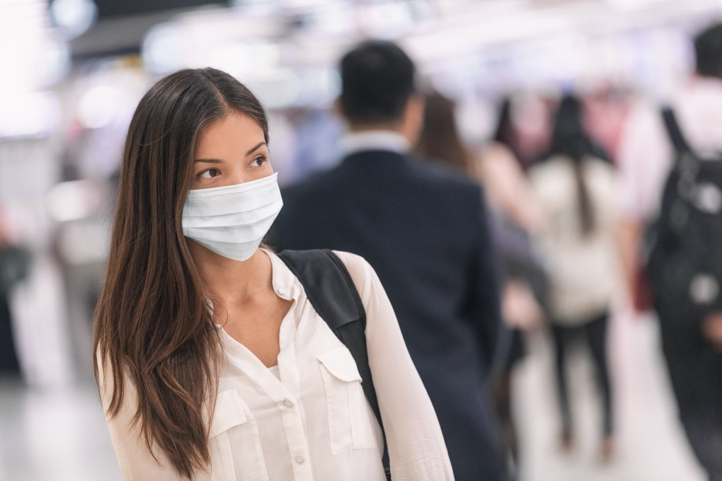 The WHO recommends disposing of face masks after one use, but what are the risks of reusing them? Photo: Shutterstock