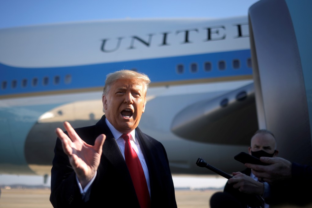 US President Donald Trump speaks to the media before boarding Air Force One in Washington on Tuesday. Photo: Reuters