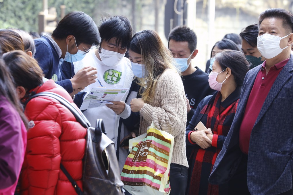 Potential buyers line up at the sales office for Wheelock Properties’ Monaco development. Photo: Dickson Lee