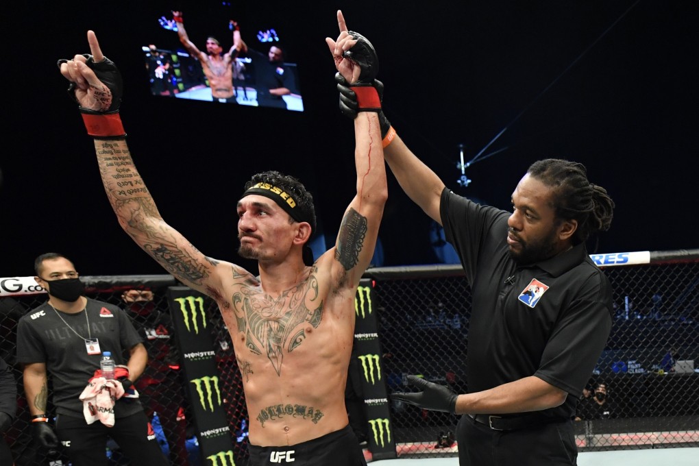 Max Holloway celebrates after his unanimous decision victory over Calvin Kattar in their featherweight main event at UFC Fight Island 7 inside the Etihad Arena on January 17, 2021 in Abu Dhabi. Photos: Jeff Bottari/Zuffa LLC
