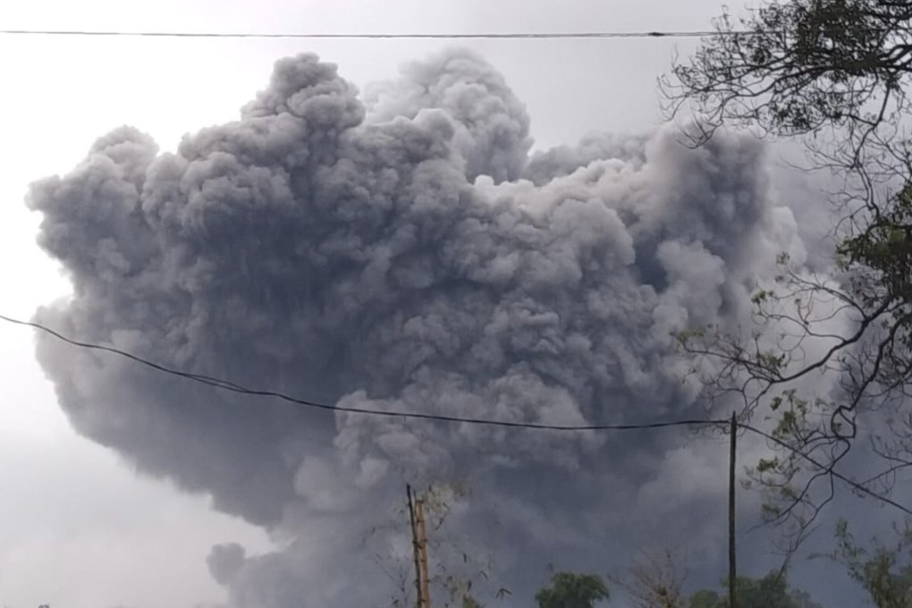Mount Semeru spews volcanic material during an eruption in Lumajang, East Java, Indonesia on Saturday. Photo: National Disaster Mitigation Agency via A