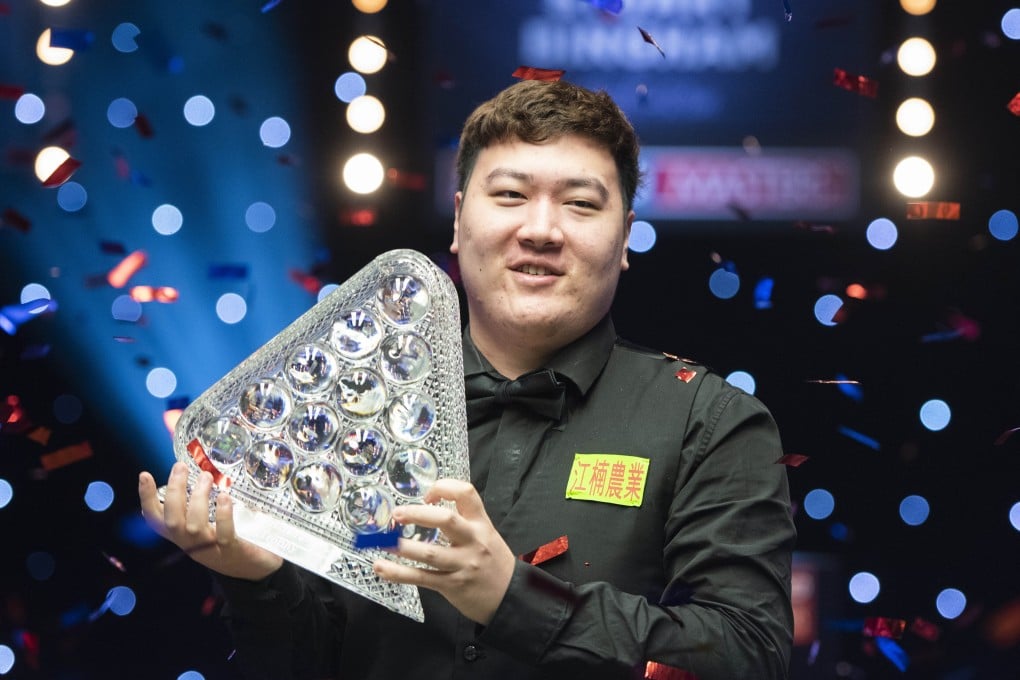 China’s Yan Bingtao with the Paul Hunter Trophy after winning the Masters snooker final against Scotland’s John Higgins in Milton Keynes, England. Photo: Xinhua