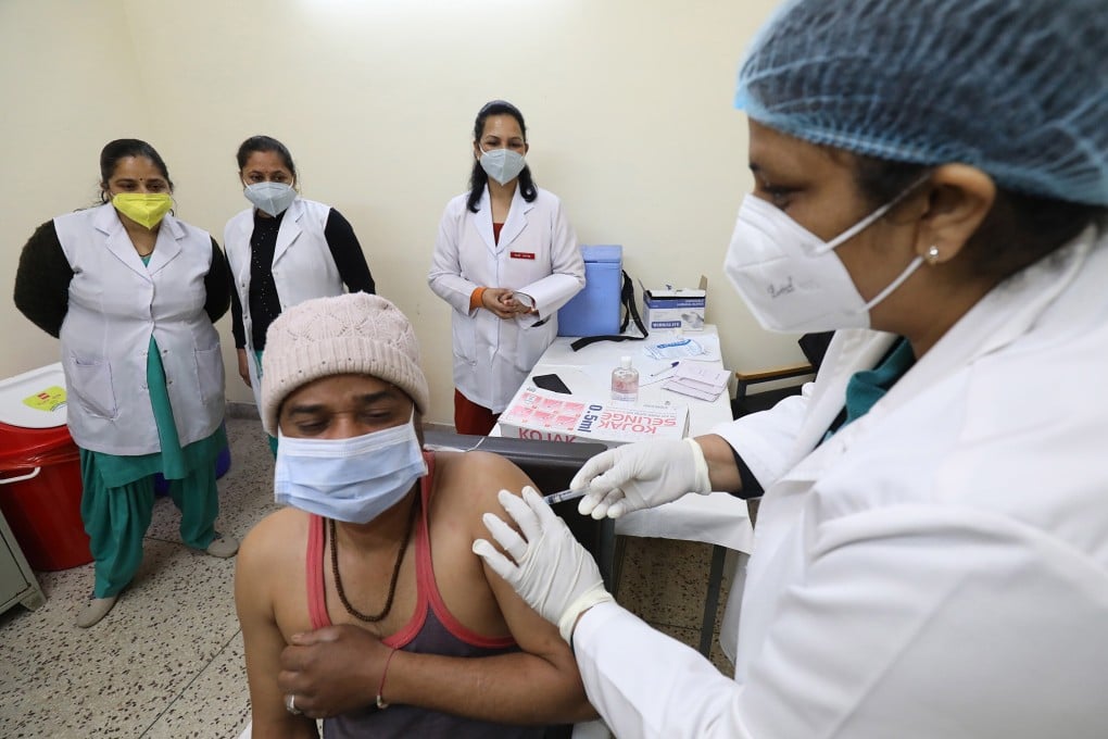 A resident of Himachal Pradesh, India, gets the first dose of a Covid-19 vaccine shot at a clinic in on Monday. Photo: EPA-EFE