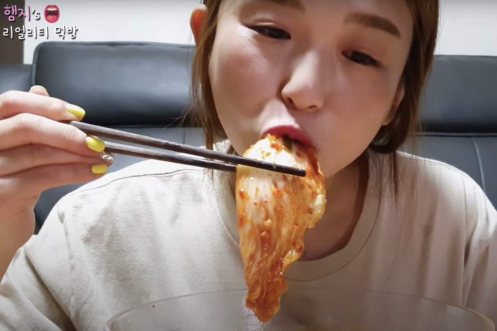 South Korean YouTuber Hamzy eats kimchi during a mukbang live-stream on her channel – on which she binge-eats food. She became caught in the crossfire of a cultural clash over whether kimchi, a fermented cabbage dish, is Korean or Chinese. Photo: YouTube/Hamzy