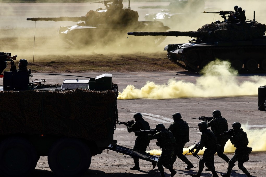 Taiwanese soldiers in action inside the Hukou military base in Hsinchu on Tuesday. Photo: EPA-EFE
