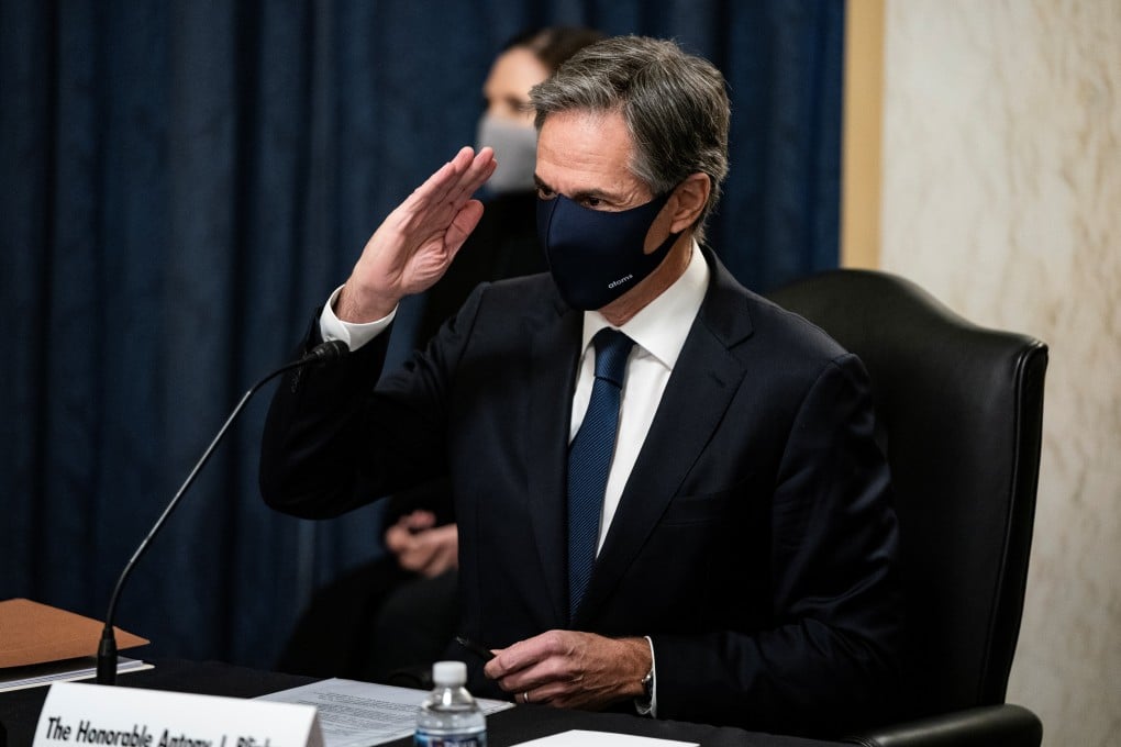 Antony Blinken, President-elect Joe Biden’s nominee to be secretary of state, salutes US senators as he arrives for his confirmation hearing before the Senate Foreign Relations Committee on Tuesday. Photo: Reuters