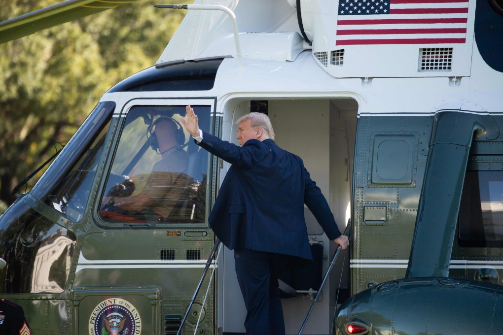 Donald Trump boards Marine One as he leaves departs the White House in Washington, on October 14, 2020. Photo: AFP