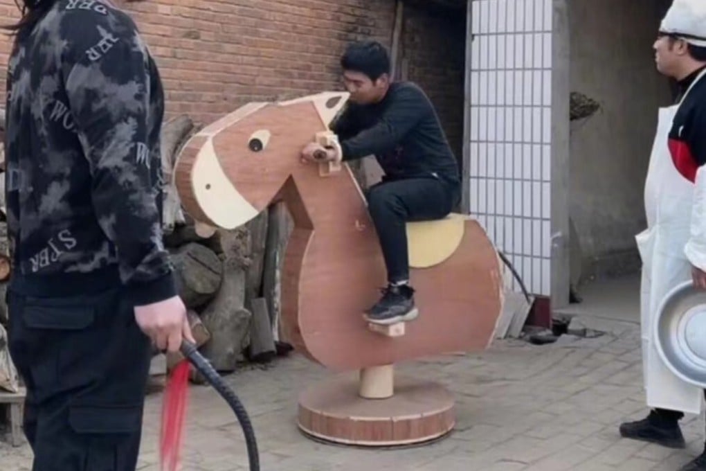 Chinese internet personality ‘Useless Edison”’ a welder called Geng Shuai, shows his ‘wooden donkey’, modelled on a contraption rated among the worst instruments of torture in history, and invented in China 1,000 years ago. He apologised for posting a video of it, and said he was ignorant of its usage. Photo: Useless Edison
