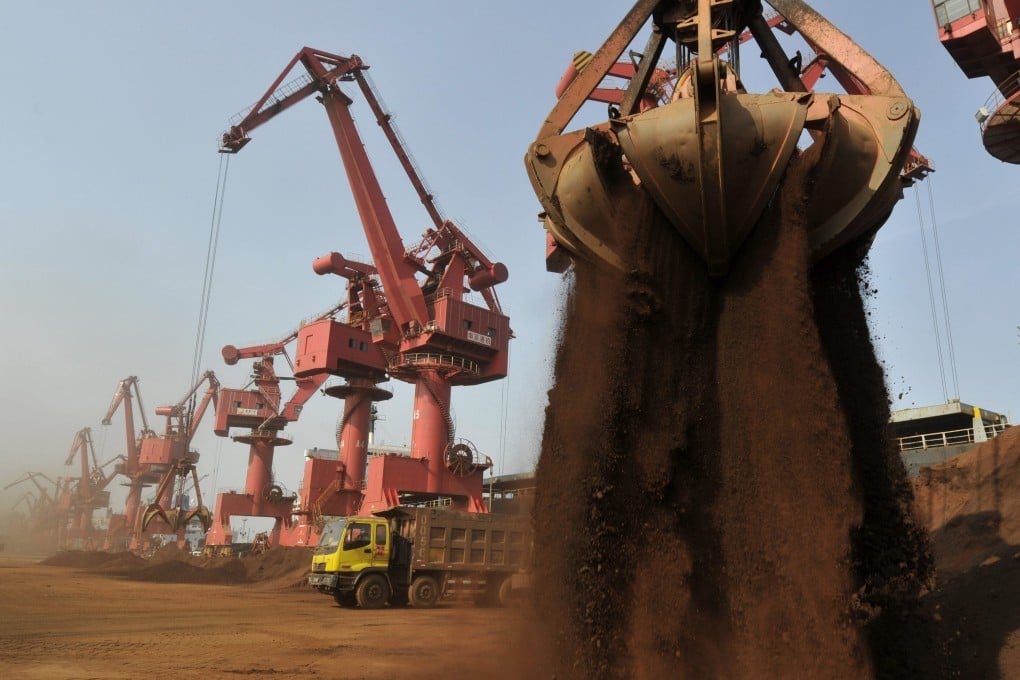 Iron ore from India is unloaded at the Port of Rizhao, one of China's biggest ports for importing the commodity, in Shandong province. Photo: Reuters