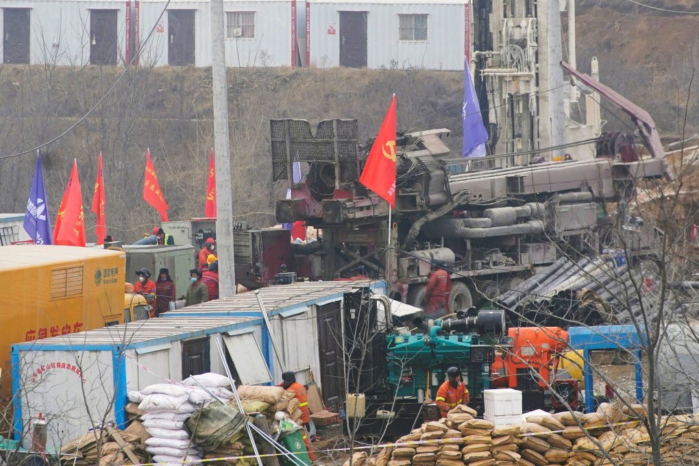 Attempts to rescue 21 Chinese workers from a gold mine have been complicated by a massive blockage that has delayed drilling efforts. Photo: Reuters
