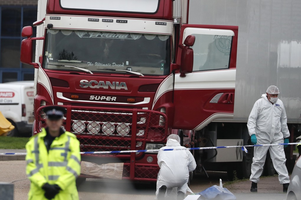 British forensics officers work on the truck, which was found to contain the bodies of 39 people, at an industrial estate east of London in 2019. File photo: AP