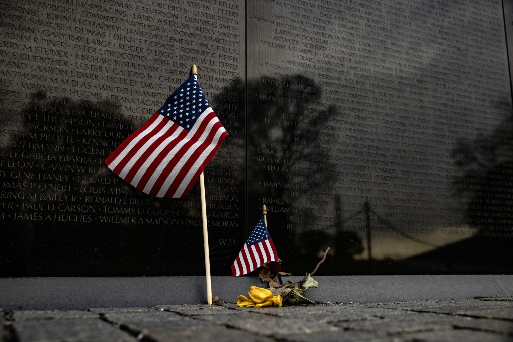 American flags at the base of the Vietnam Veterans Memorial Wall in Washington, DC. Photo: AFP