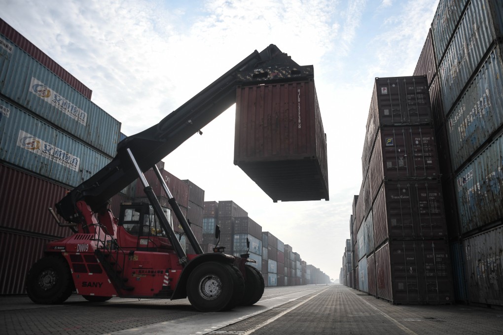 A container is moved at the Qinzhou port in south China’s Guangxi Zhuang autonomous region on December 28. Photo: Xinhua
