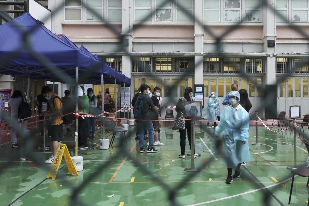 People queue for Covid-19 tests at Yau Ma Tei Community Hall. Photo: Xiaomei Chen