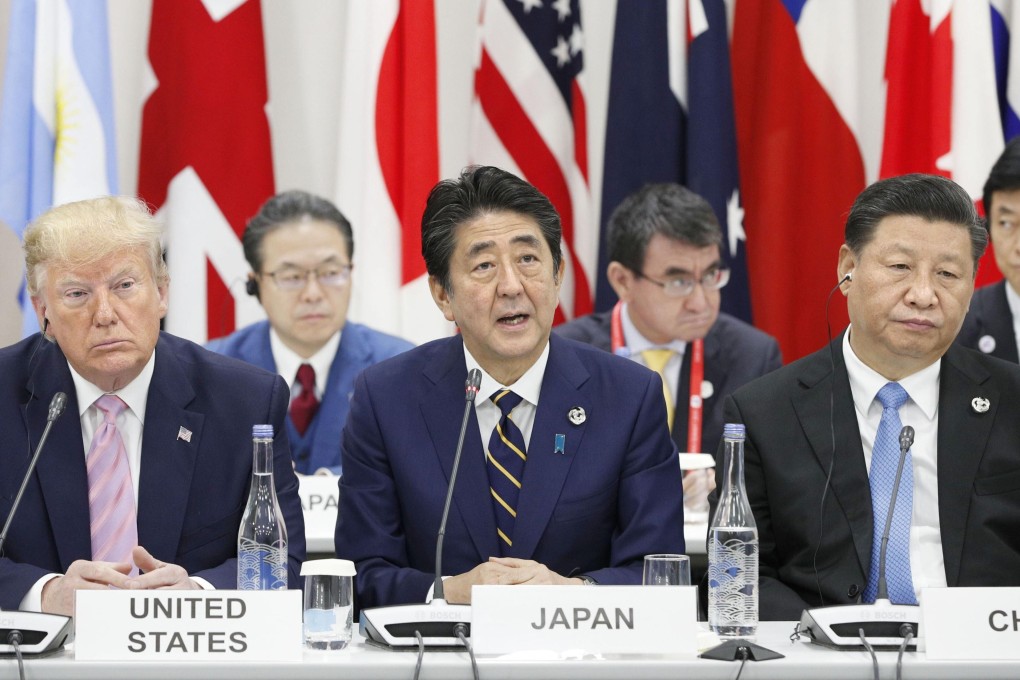 Then US president Donald Trump (left) sits with Japan’s then prime minister Shinzo Abe and China’s President Xi Jinping at the G20 Summit in Osaka, Japan, on June 28, 2019. A vision of trilateral cooperation that includes the US, China and Japan would prevent Asia from becoming a theatre of US-China competition. Photo: Kyodo
