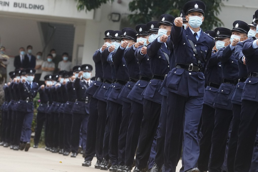 Police officers participate in a passing-out parade at the Hong Kong Police College. Photo: Winson Wong