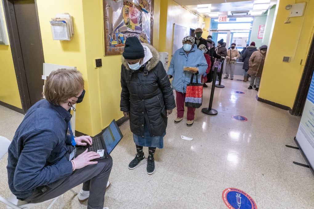 A screener registers residents at a Covid-19 vaccination site in the Brooklyn borough of New York. Photo: AP
