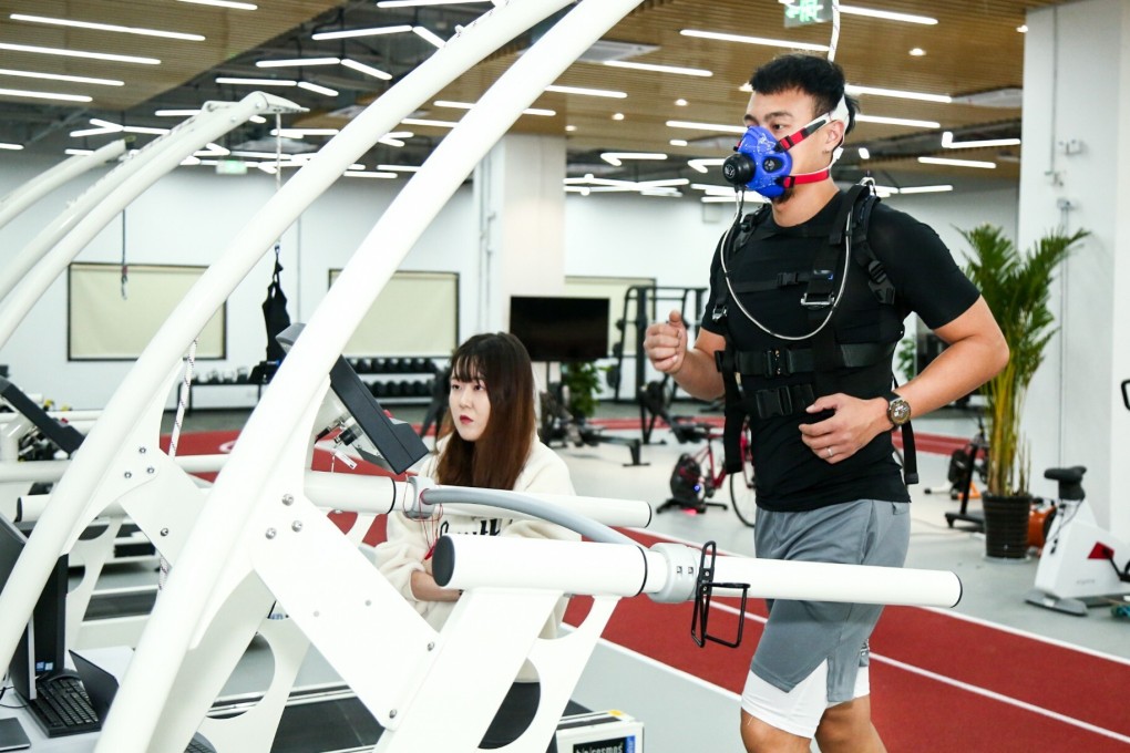 A man tests wearable devices on a sensor-filled treadmill at Huawei Technologies Co’s health research laboratory in Xian, capital of northwest China’s Shaanxi province. Photo: Handout